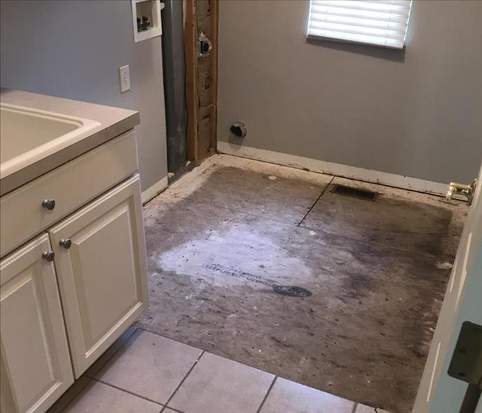 Tile removed to dry floor