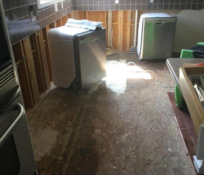 cabinets, flooring and appliances removed after water damage